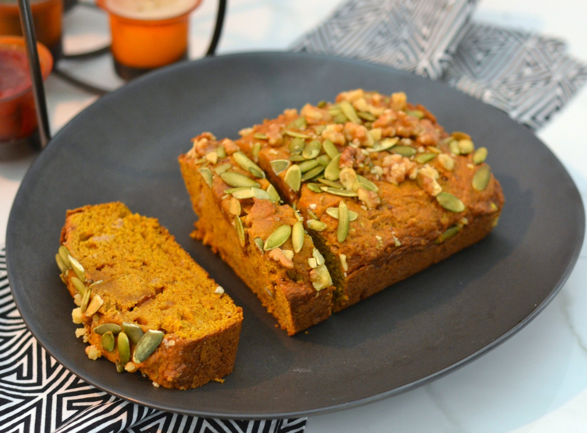 Pumpkin Bread Recipe that rivals Starbucks. Topped with pepitas and walnuts. Yum! | www.thesurferskitchen.com