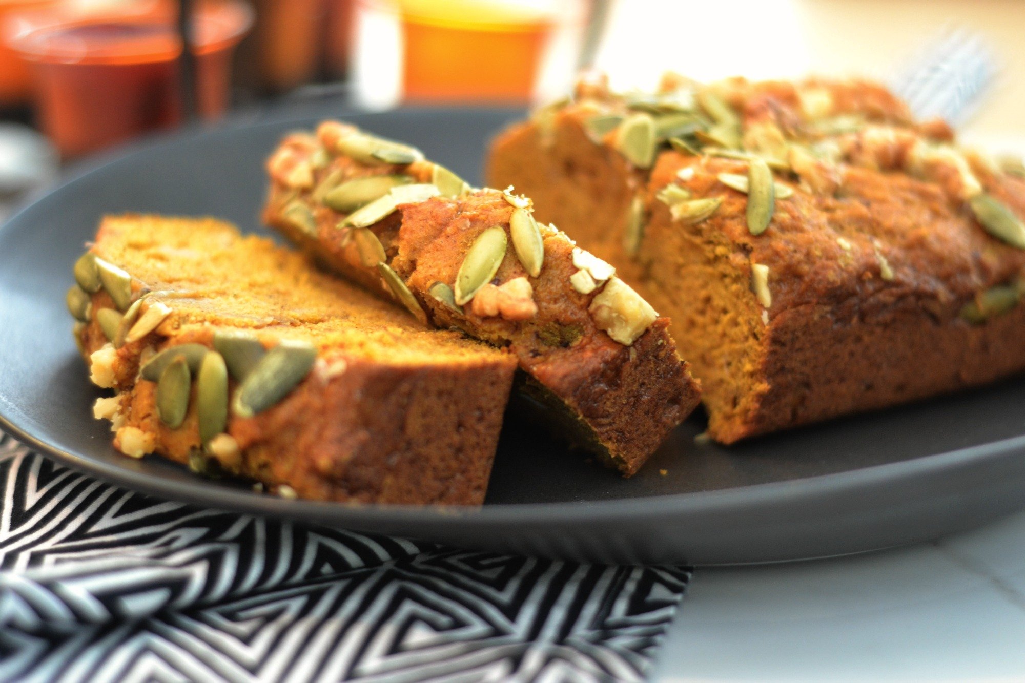 Pumpkin Bread Recipe that rivals Starbucks. Topped with pepitas and walnuts. Yum! | www.thesurferskitchen.com