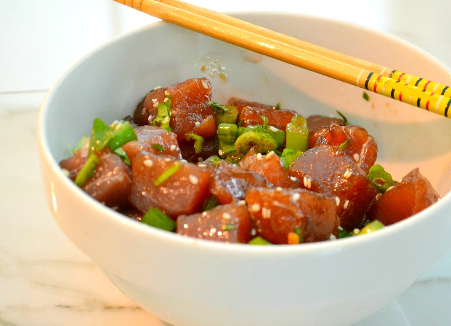 white bowl filled with poke