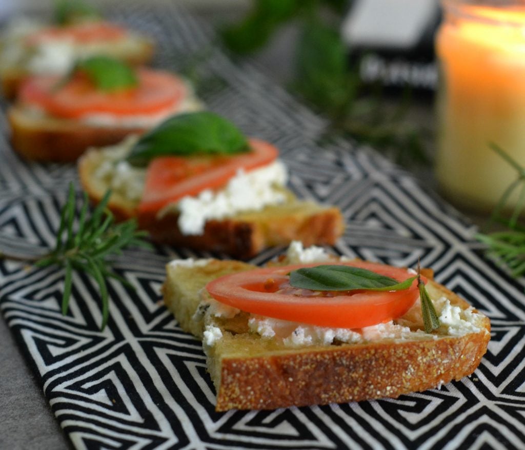 Herbed Goat Cheese Toasts Topped with Tomatoes| A perfect rainy day dinner for one or a perfect appetizer for a party. |www.thesurferskitchen.com
