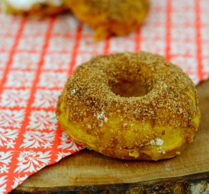 Baked Pumpkin Donuts with Cinnamon and Sugar| An easy and healthy fall breakfast. Looks like a donut and tastes like a donut but is much healthier. | www.thesurferskitchen.com