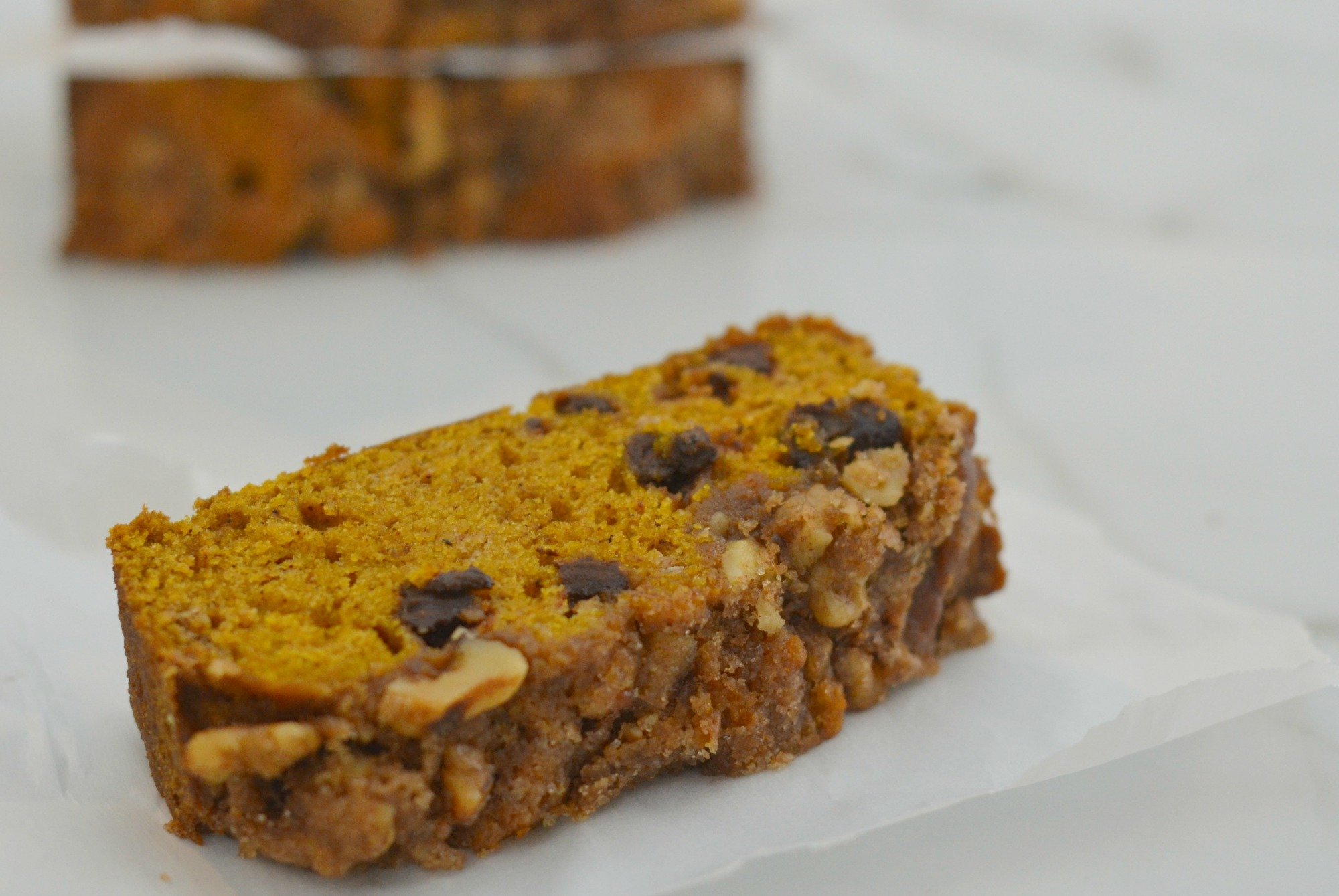 Chocolate Chip Pumpkin Bread| My basic pumpkin bread recipe with added chocolate and a special topping. So good! | www.thesurferskitchen.com