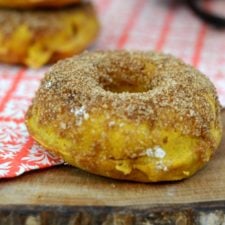 Baked Pumpkin Donuts with Cinnamon and Sugar| An easy and healthy fall breakfast. Looks like a donut and tastes like a donut but is much healthier. | www.thesurferskitchen.com