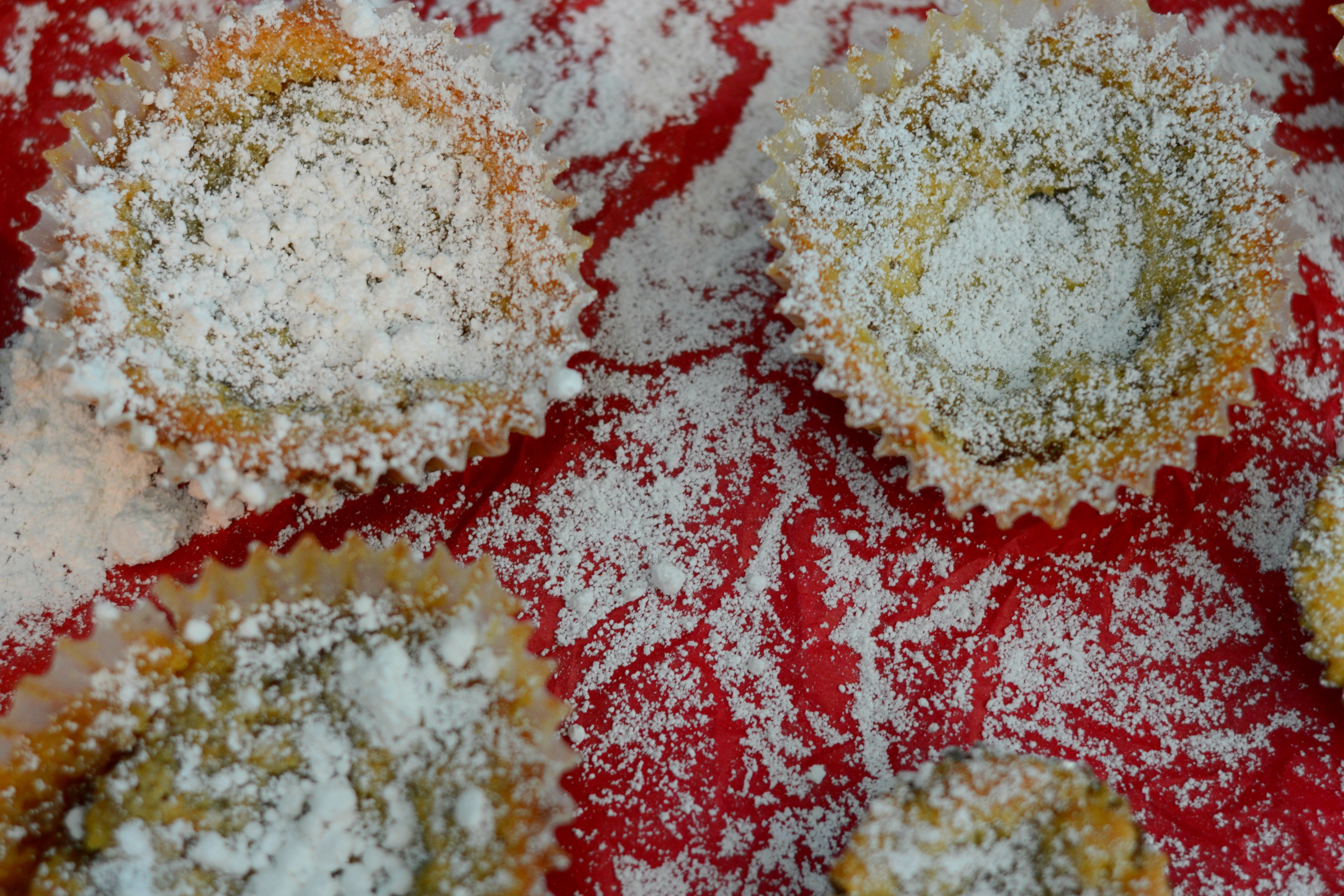 overhead view of miniature crack pies sprinkled with powdered sugar