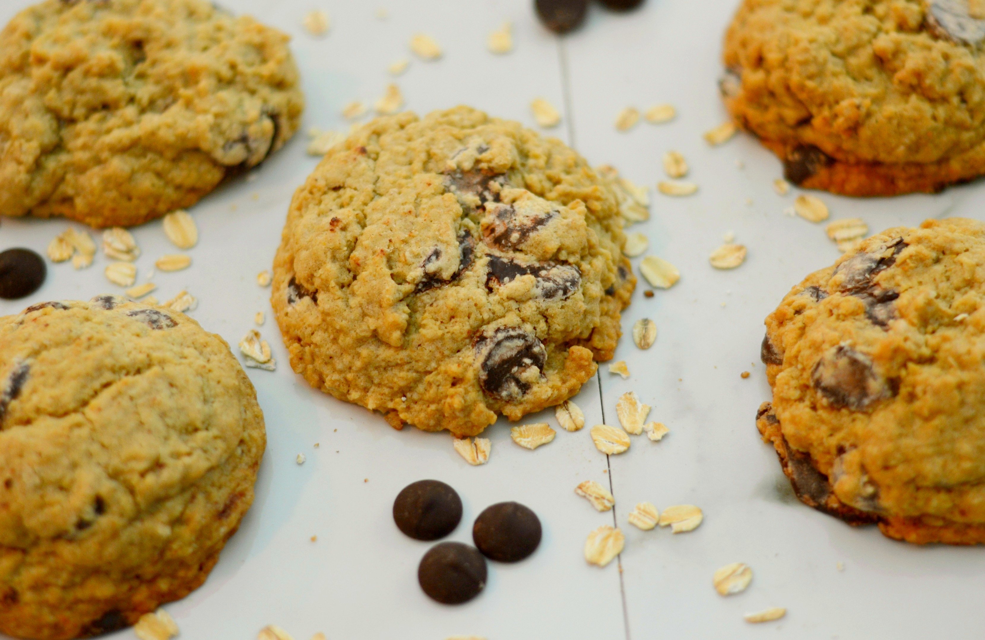 Overhead View of Giant Chocolate Chip Oatmeal Cookies on a White Background