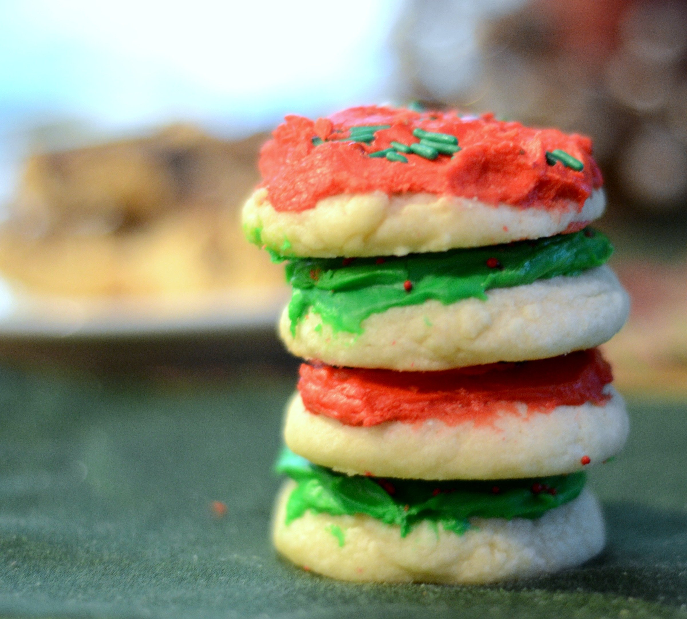 a stack of red and green soft sugar cookies