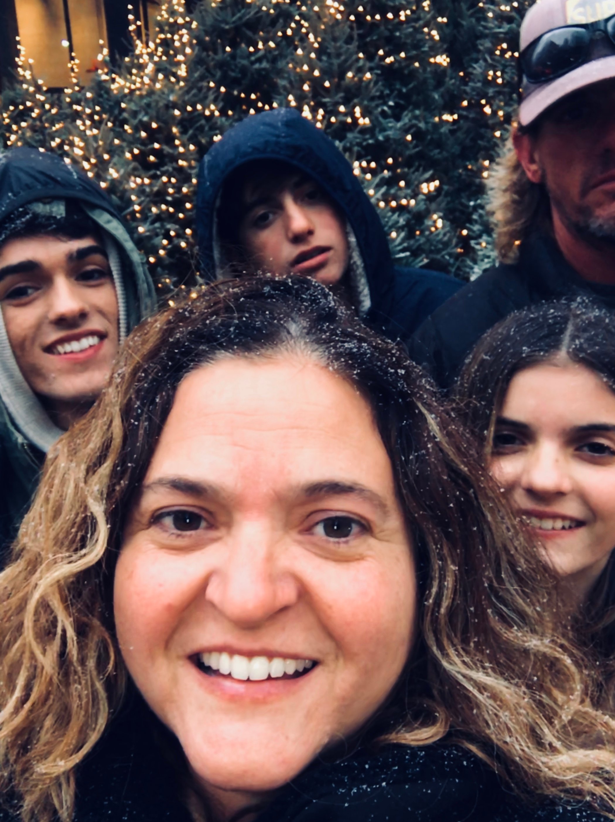 family of five selfie in New York City in the snow