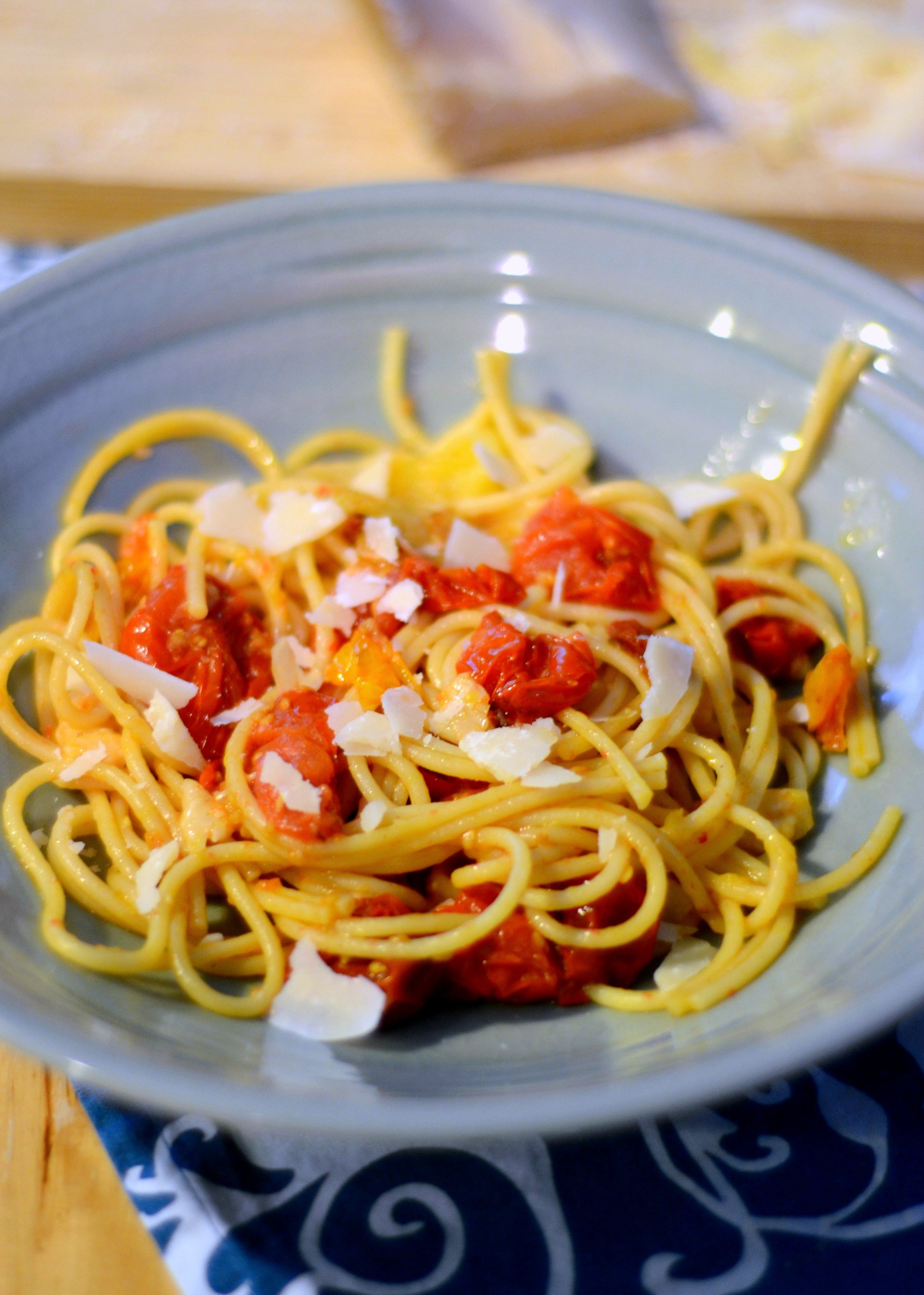 bowl of pasta with roasted tomatoes and Parmesan 