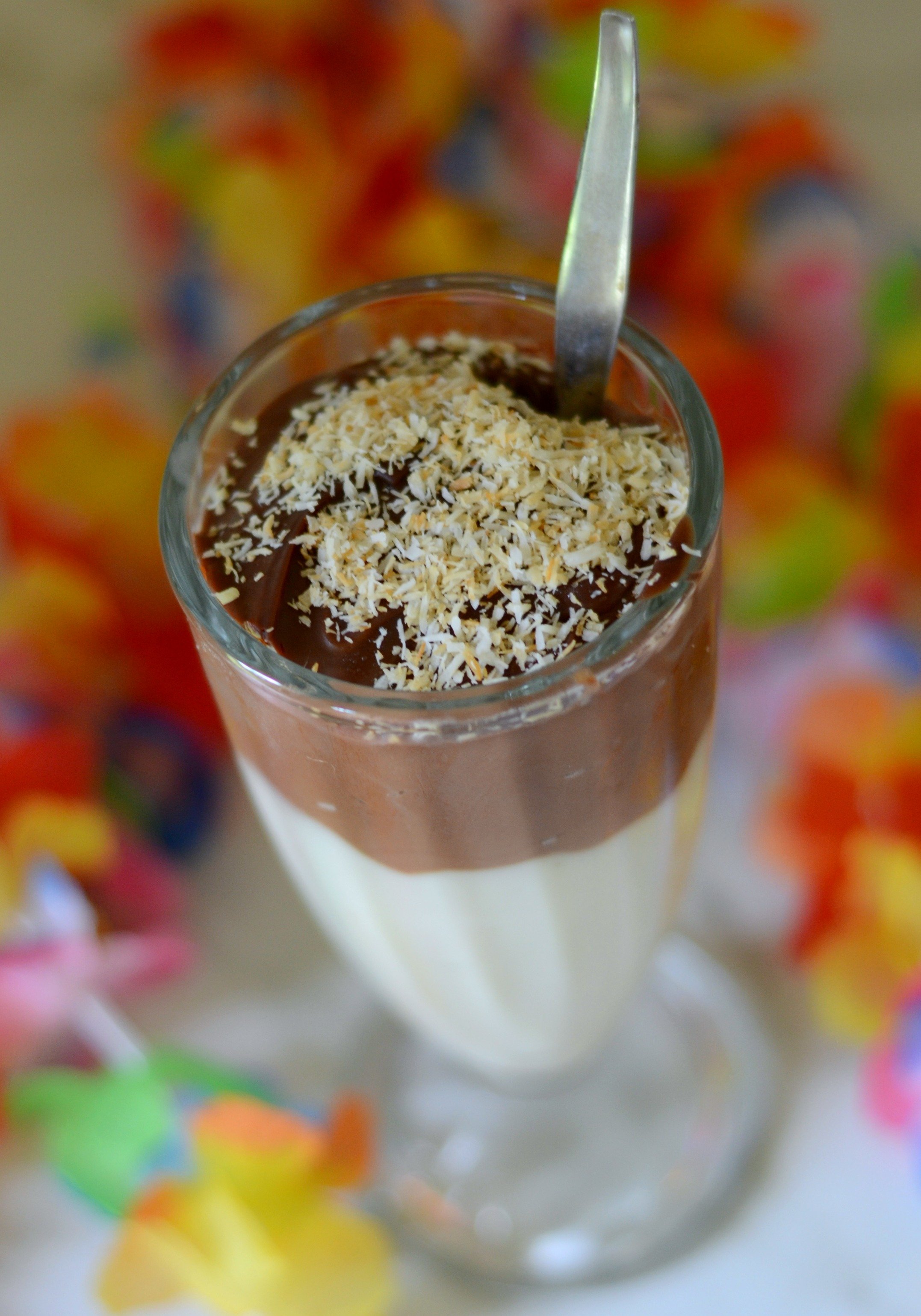 overview of chocolate coconut haupia pudding sprinkled with toasted coconut