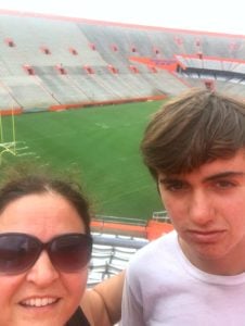 mom and son tired after running the stadium stairs at Gator Stadium University of Florida